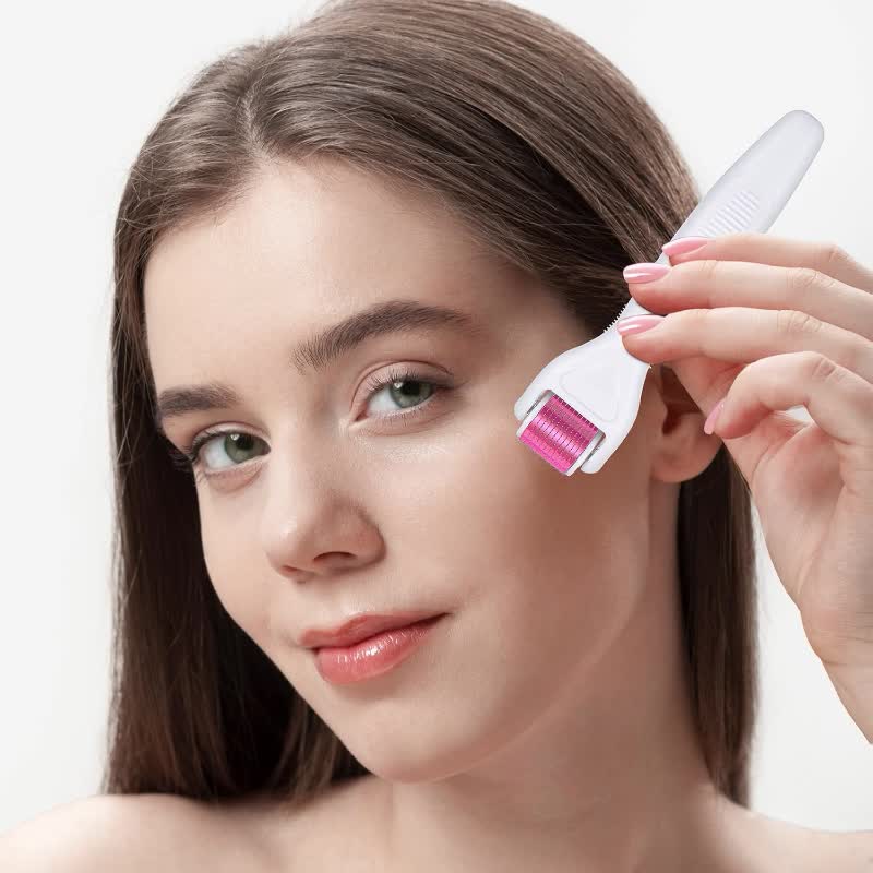 Vit micronålsroller med fyra utbytbara huvuden och rosa förvaringsetui