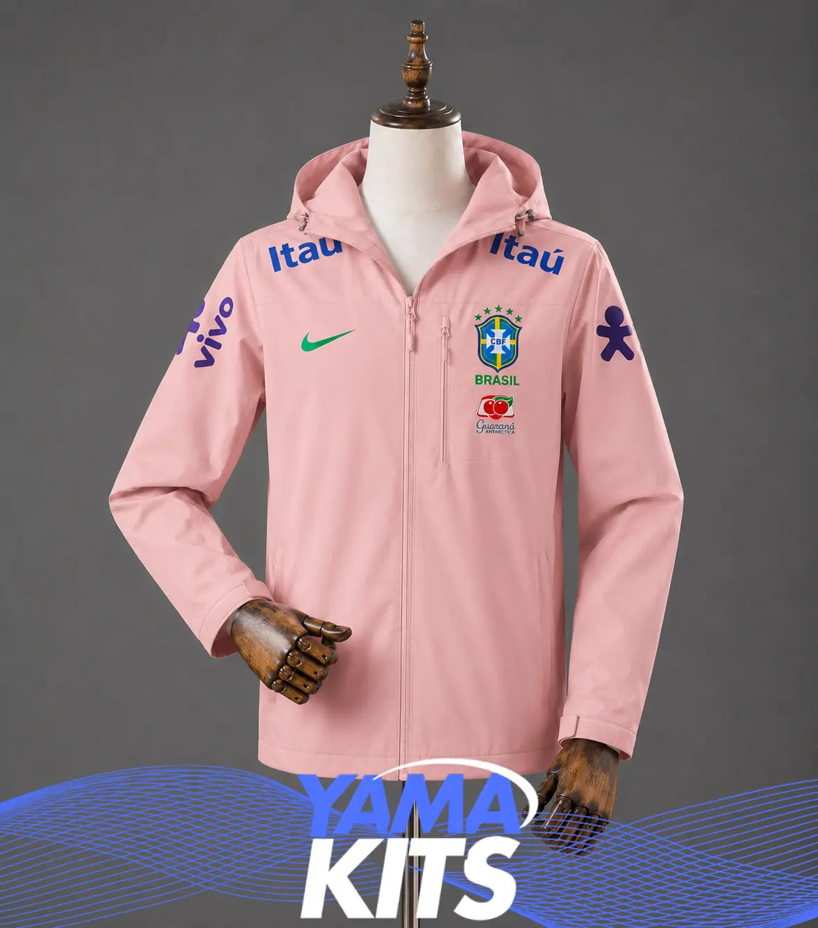 Rosa jacka med huva, dragkedja och Brasilieninspirerade märken