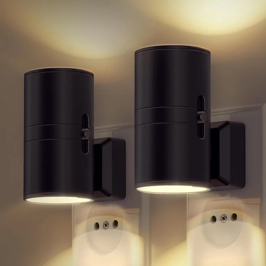 Cylindrisk LED-vägglampa med integrerad kontakt och dag- och nattsensor
