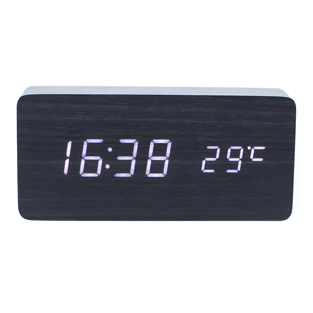 Digital väckarklocka med LED-display som visar tid och temperatur