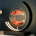 LED-bordslampa med rund sandbild, lysande bågform och rektangulär bas