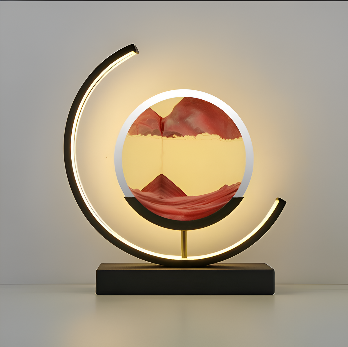 LED-bordslampa med rund sandbild, lysande bågform och rektangulär bas
