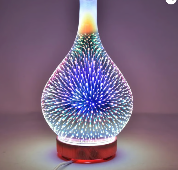 Genomskinlig droppformad ultraljudsdiffuser med 3D-ljuseffekt och brun träeffektbas