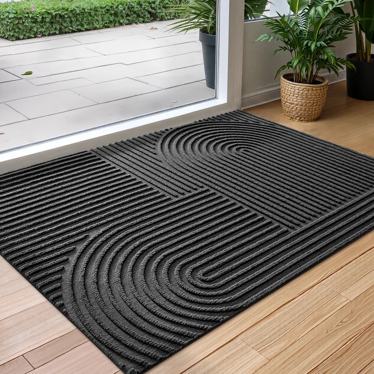 Rektangulär dörrmatta med vattenabsorberande yta och geometriskt reliefmönster