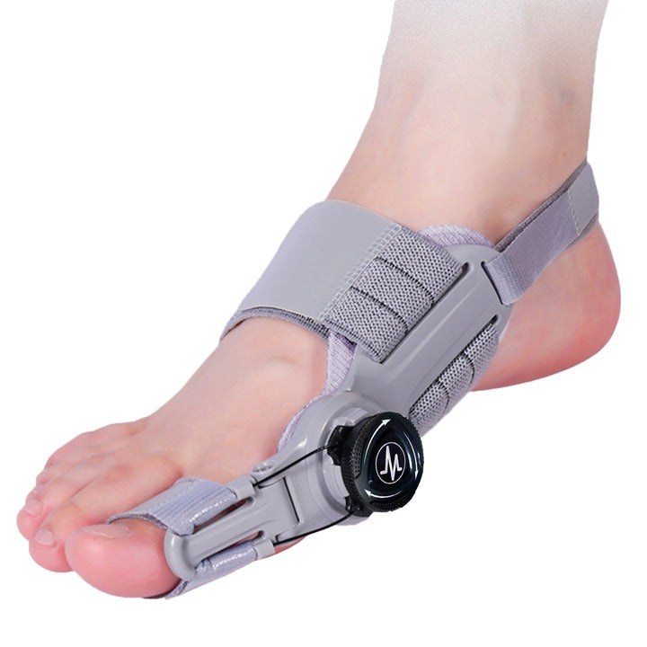 Grått hallux valgus-stöd med fotrem, tårem och vridbar justering