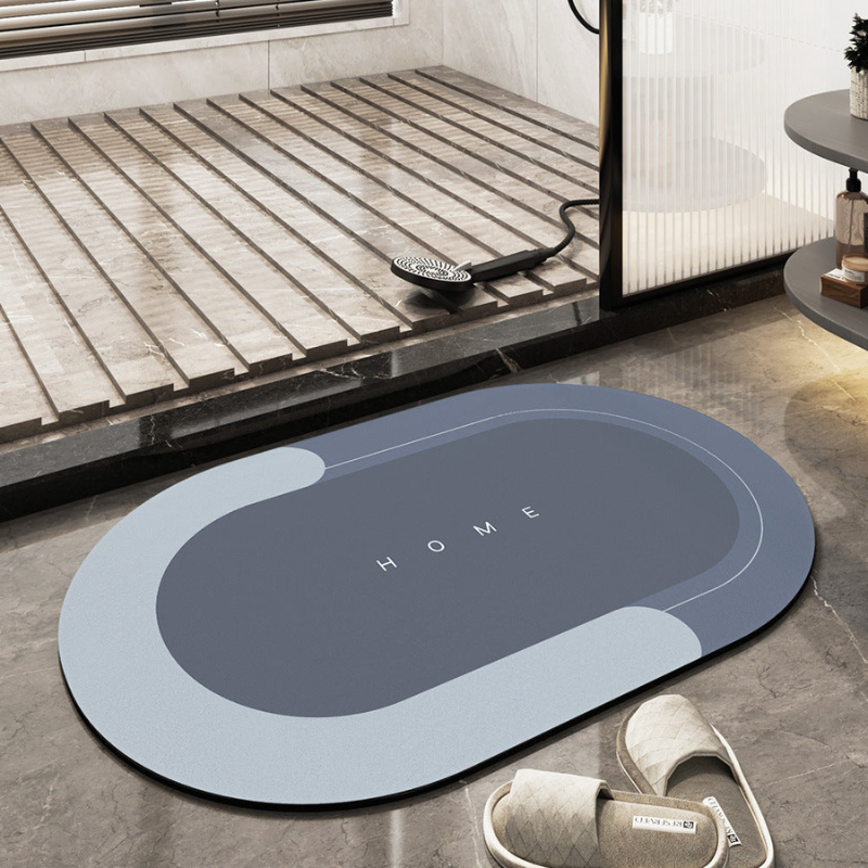 Oval absorberande och halkfri golvmatta med grafiskt mönster