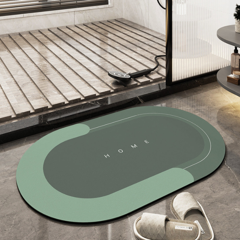 Oval absorberande och halkfri golvmatta med grafiskt mönster