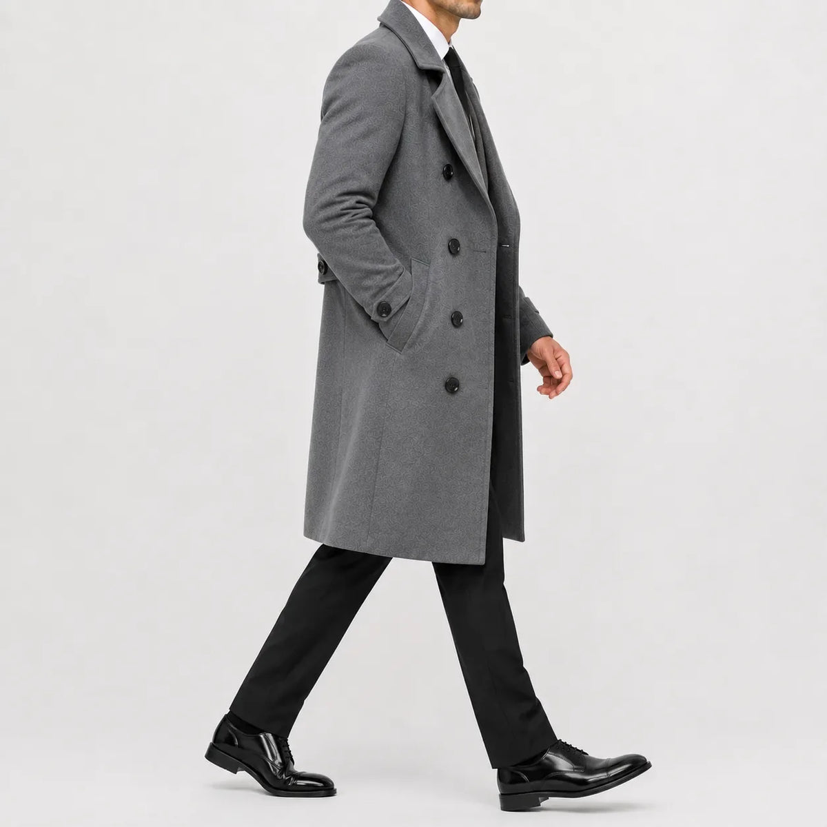 Dubbelknäppt trenchcoat med slagkrage, sidfickor och långa ärmar