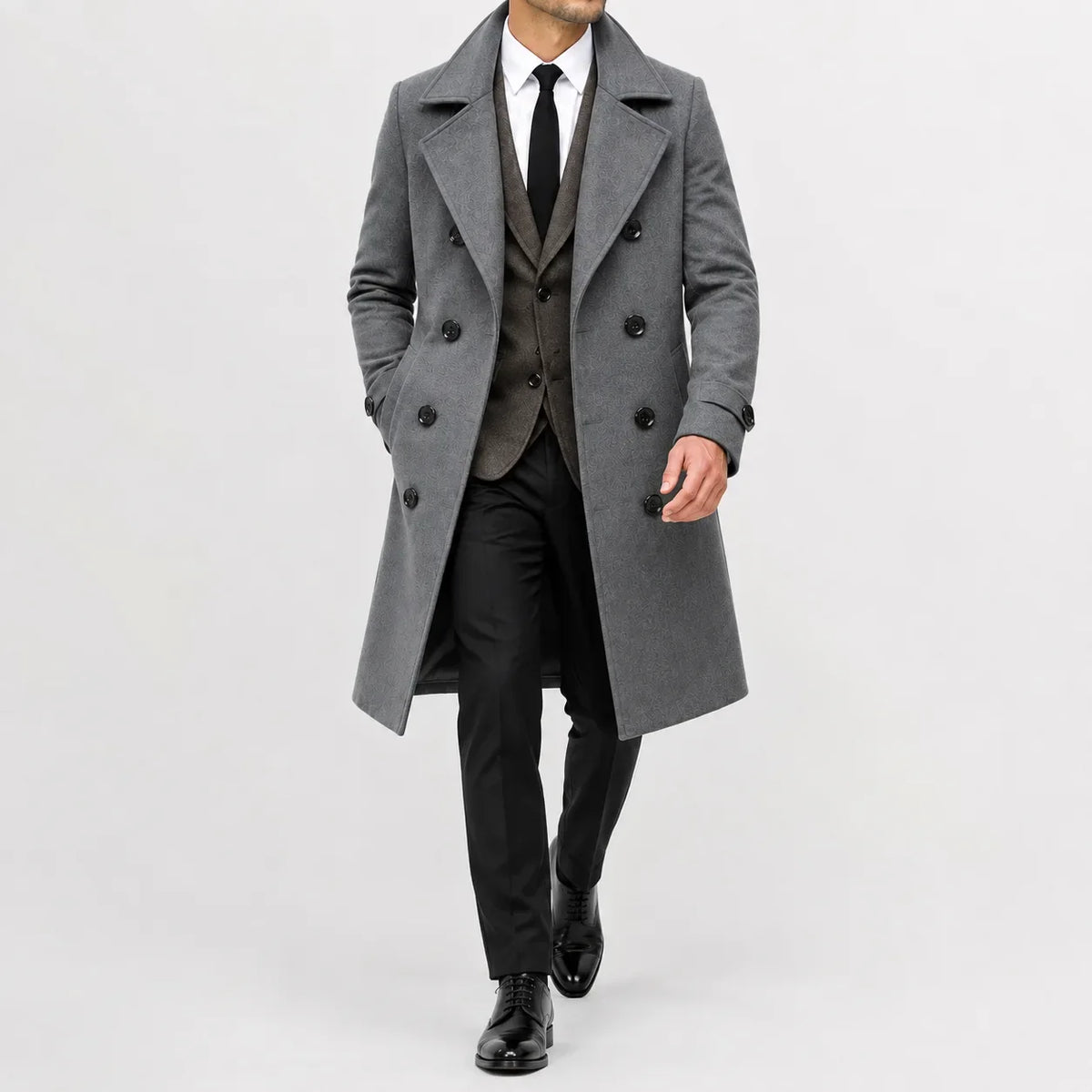 Dubbelknäppt trenchcoat med slagkrage, sidfickor och långa ärmar