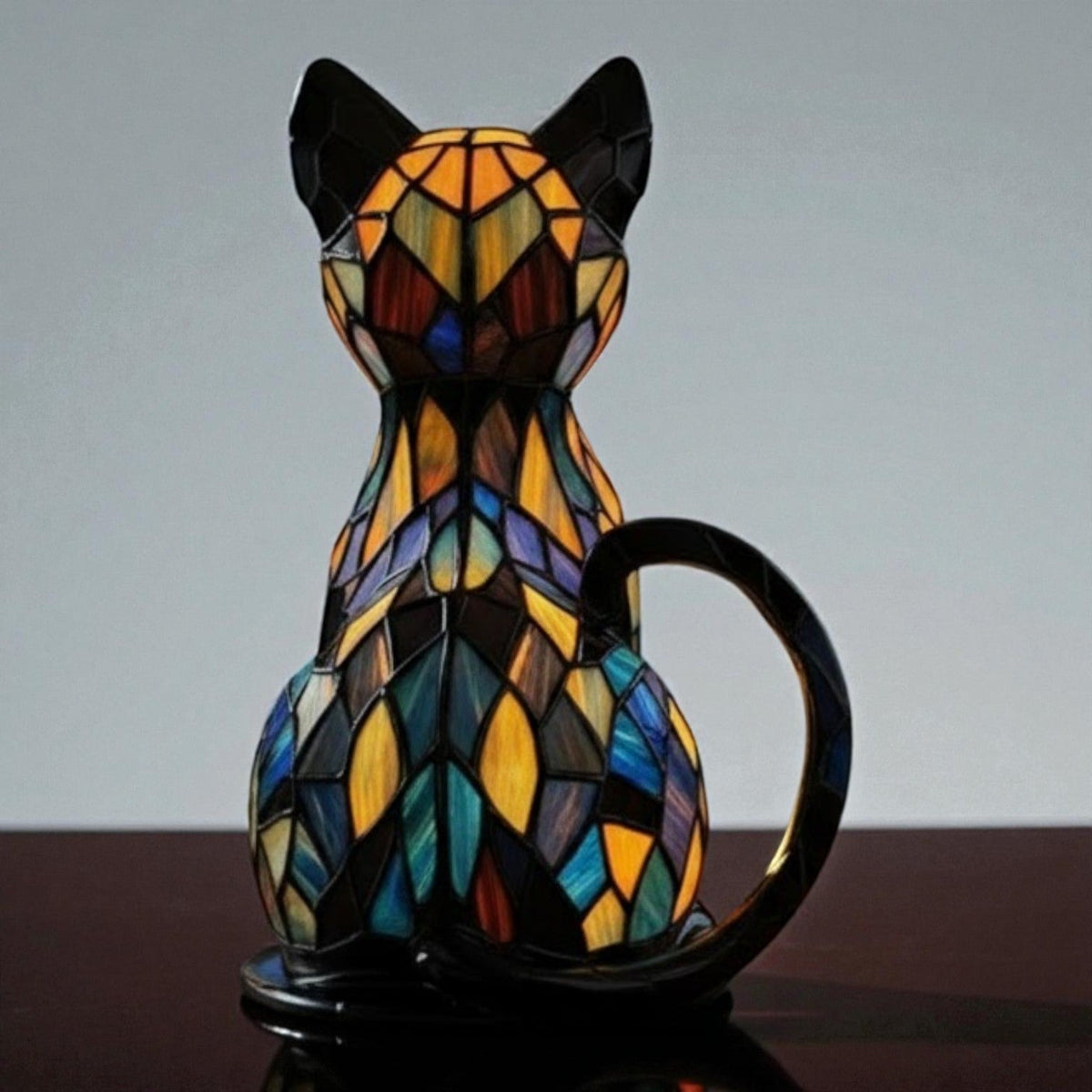 Dekorativ svart LED-bordslampa formad som en katt med färgat mosaikmönster