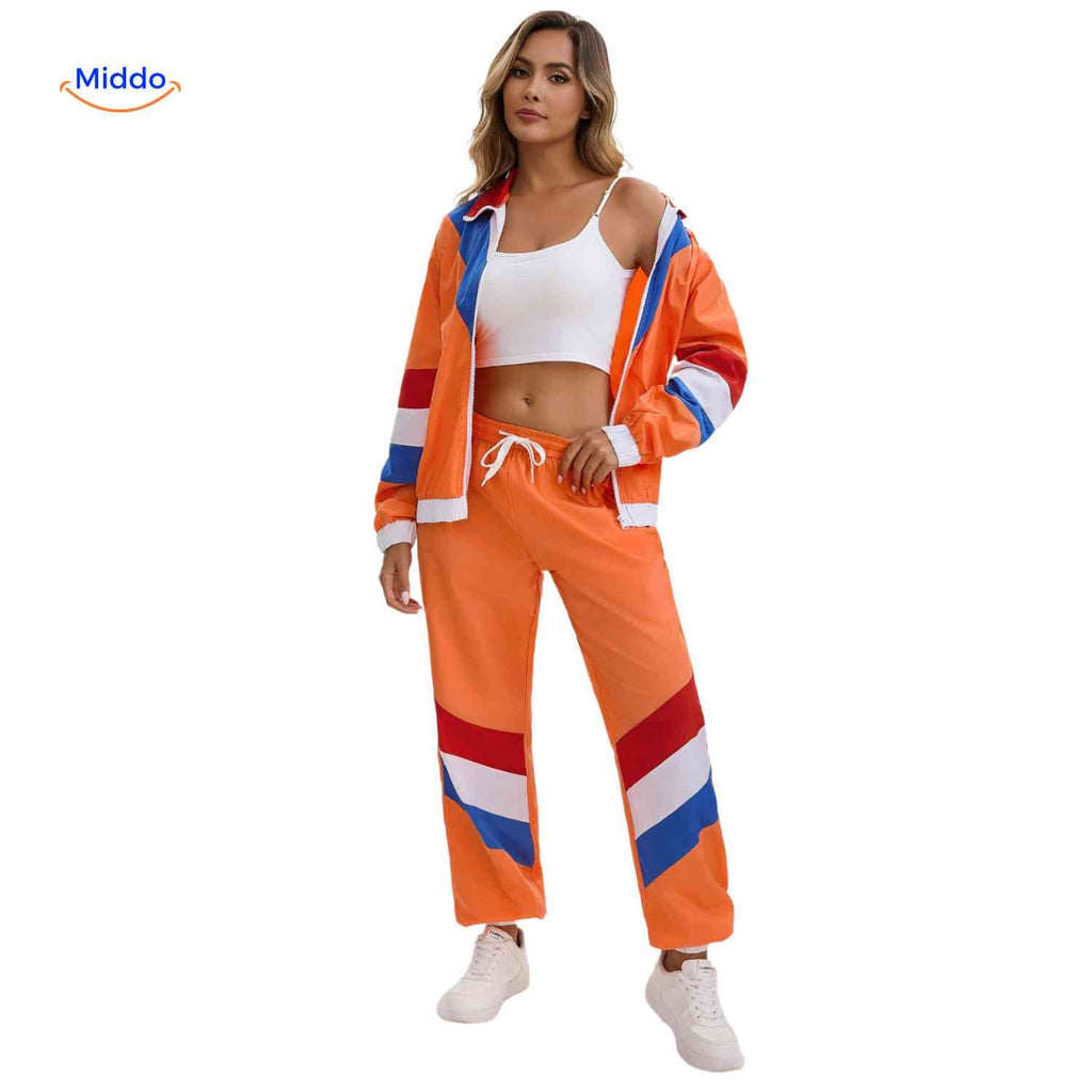 Orange unisex träningsset med jacka och byxor i färgblock